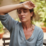 a woman who is hot and uncomfortable